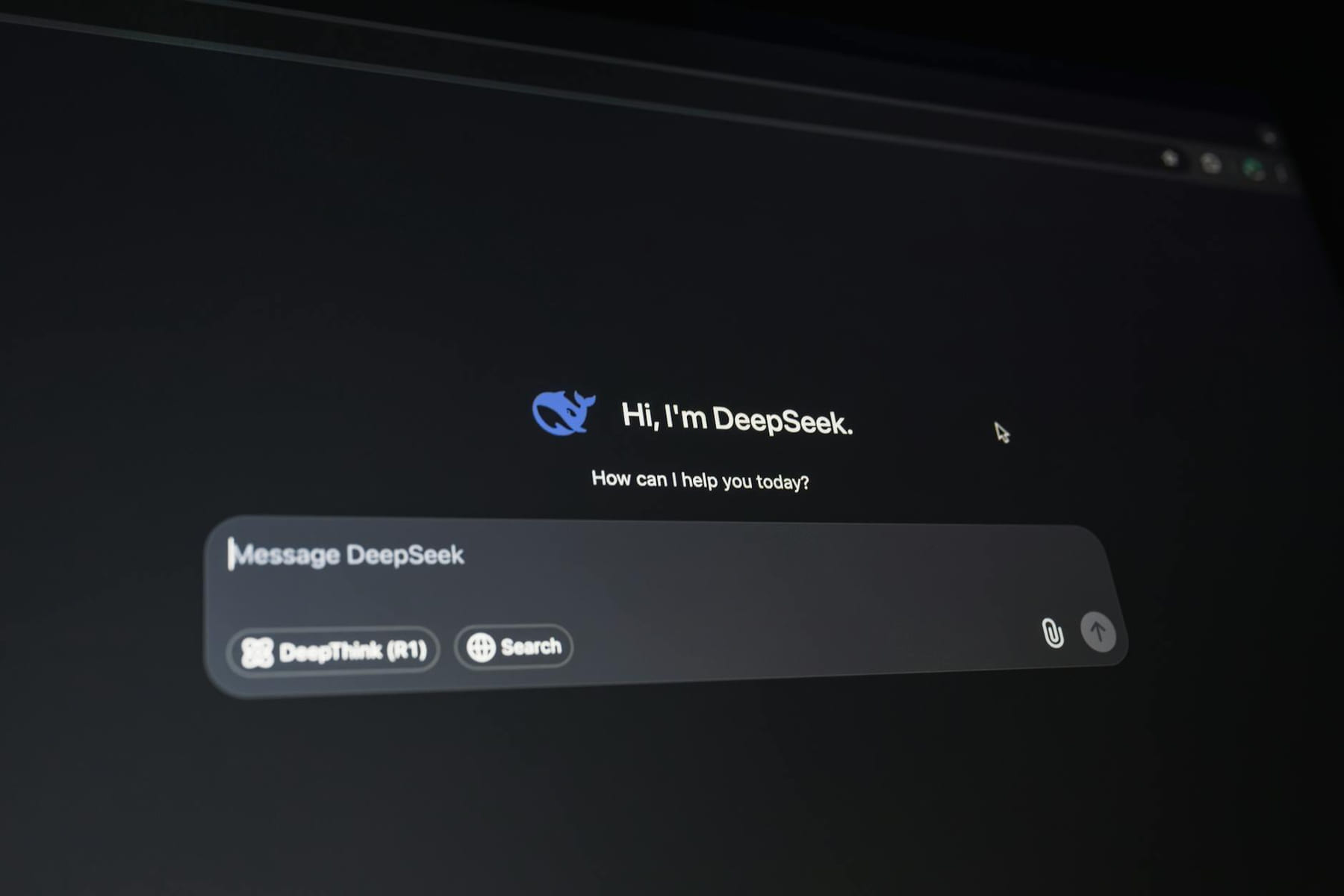Close-up of a digital assistant interface on a dark screen, showcasing AI technology communication. on Quest on Chain