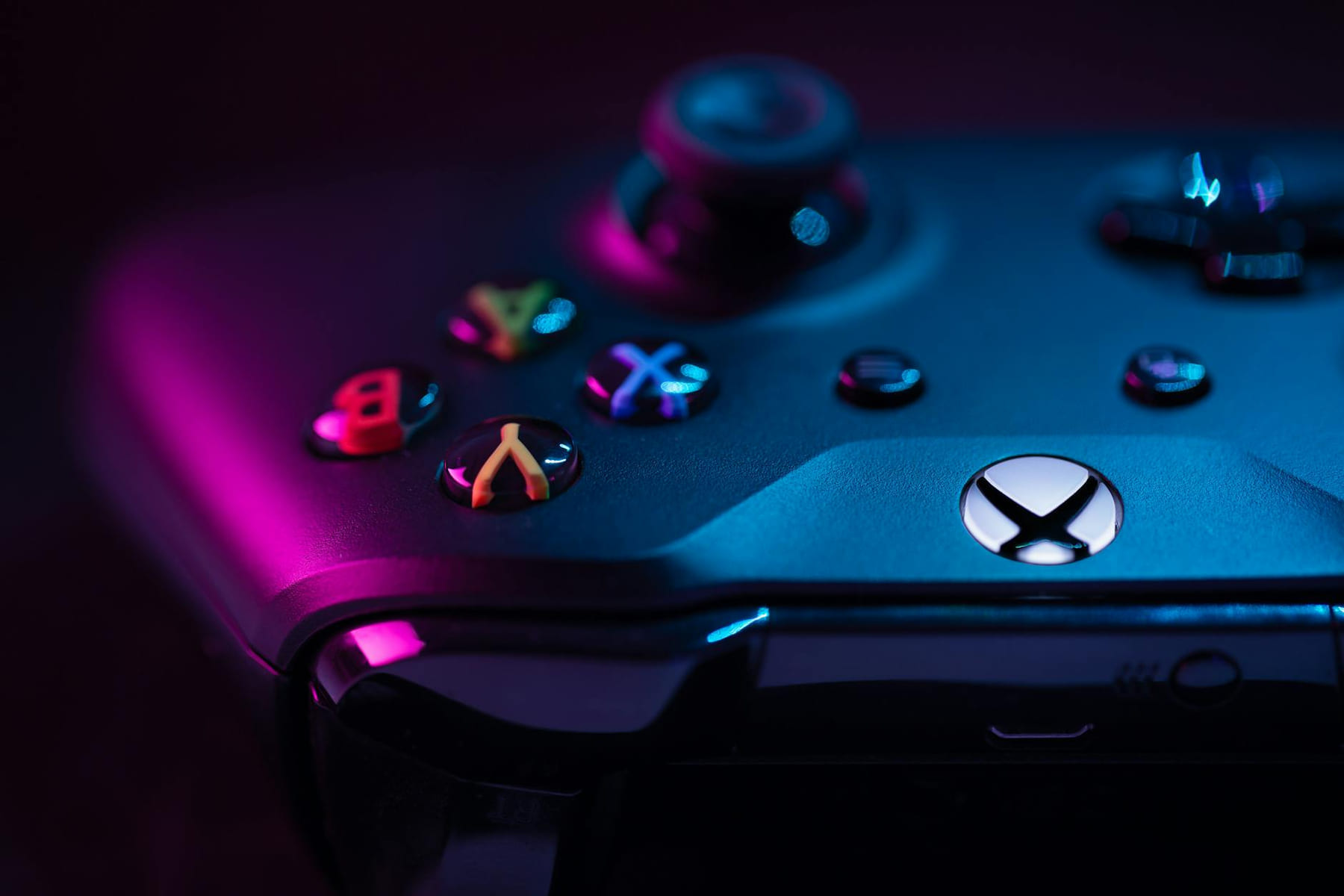 Detailed image of a game controller with colorful LED lighting on Quest on Chain